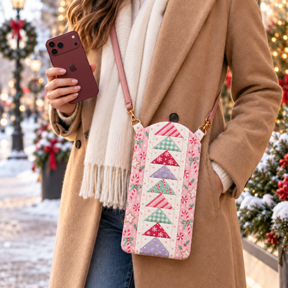 Pink Sugarplum Stroll crossbody bag styled with a camel coat on a snowy Christmas street