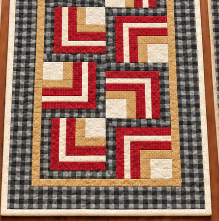 Lower end of the Buffalo Check Log Cabin farmhouse table runner showing the buffalo check border and cream binding