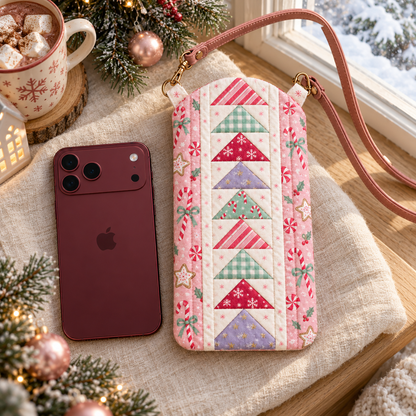 Sugarplum Stroll phone crossbody bag beside a burgundy phone in soft winter window light