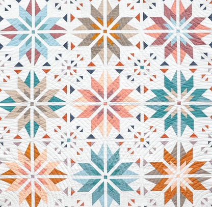 Sweet Creek Quilt Pattern PDF – close-up of star patchwork blocks in teal, orange and pink fat quarters