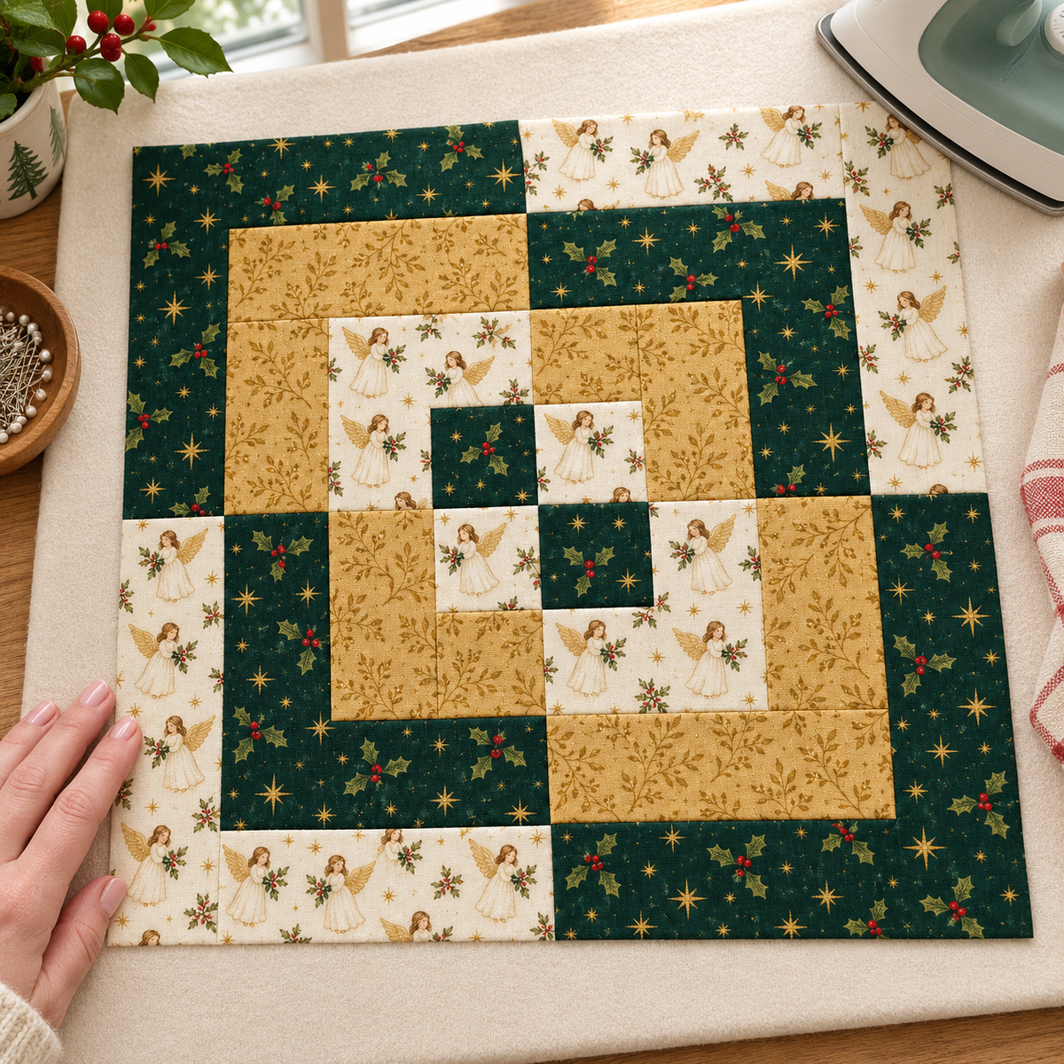 Angel & Gold Christmas quilt block on a cream pressing mat beside an iron, pins and a maker's hand. AI-generated fabric-styling illustration.