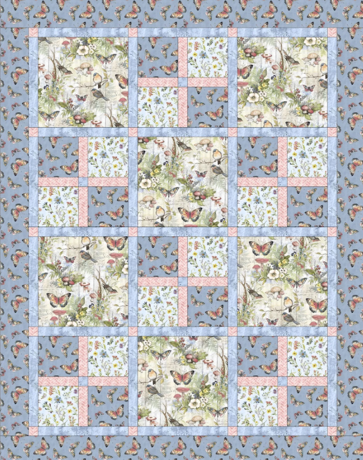Bluebird Garden Quilt Pattern PDF – flat lay view showing blue border and bird floral patchwork blocks, beginner quilting design