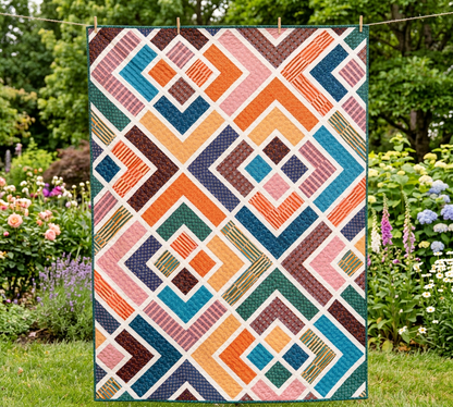 Diagonal Log Cabin Quilt Pattern PDF – Colorful geometric patchwork quilt hanging outdoors in garden