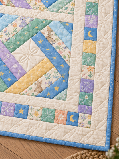 Detail illustration of the pastel patchwork border and sky-blue binding