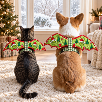 Cat and corgi wearing matching green holiday wings beside a snowy winter window. AI-generated fabric-styling illustration.