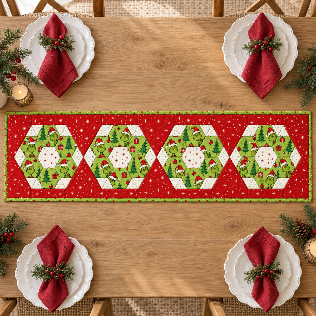 Overhead view of the red and green four-medallion Christmas table runner on an oak table