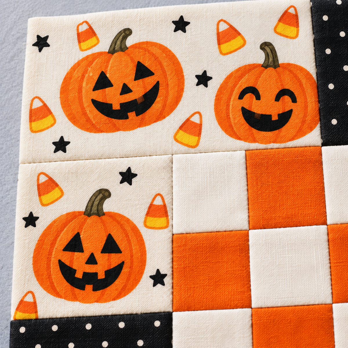 Close-up of pumpkin and candy corn fabric-print inspiration — AI-generated styling illustration