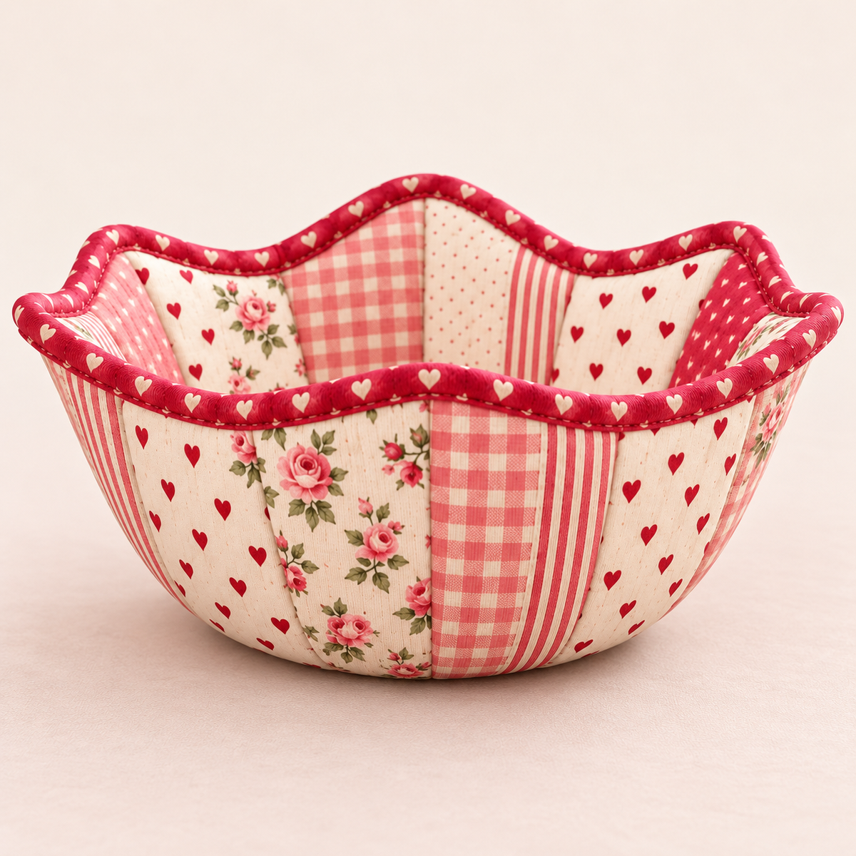 Side view of the Roseheart bowl cozy showing pieced fabric panels and shaped rim