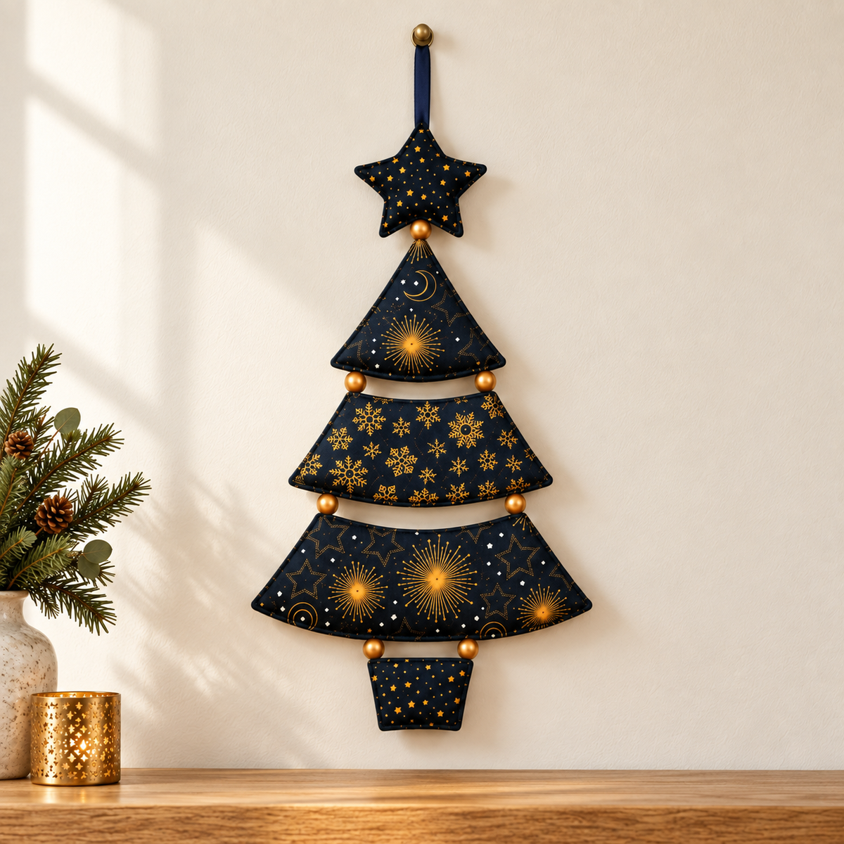 Starlit Evergreen navy and gold fabric Christmas tree wall hanging on an ivory wall; AI-generated styling illustration